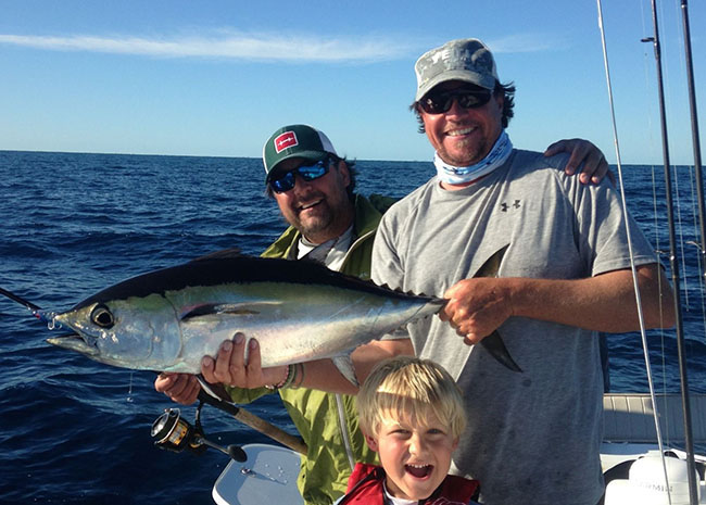 Elmer with his family after a great fishing day.